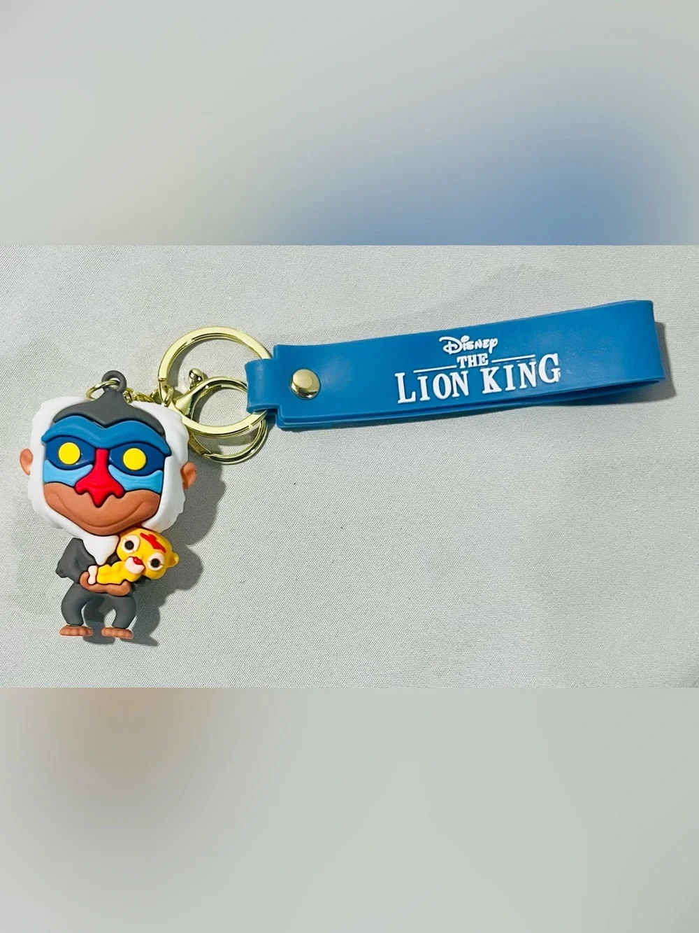 Disney Lion King Rafiki Rubber Keychain with Blue Strap